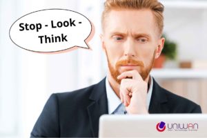 Dirigeant de PME réfléchissant avant de cliquer, avec le message STOP LOOK THINK pour illustrer les bons réflexes en cybersécurité.